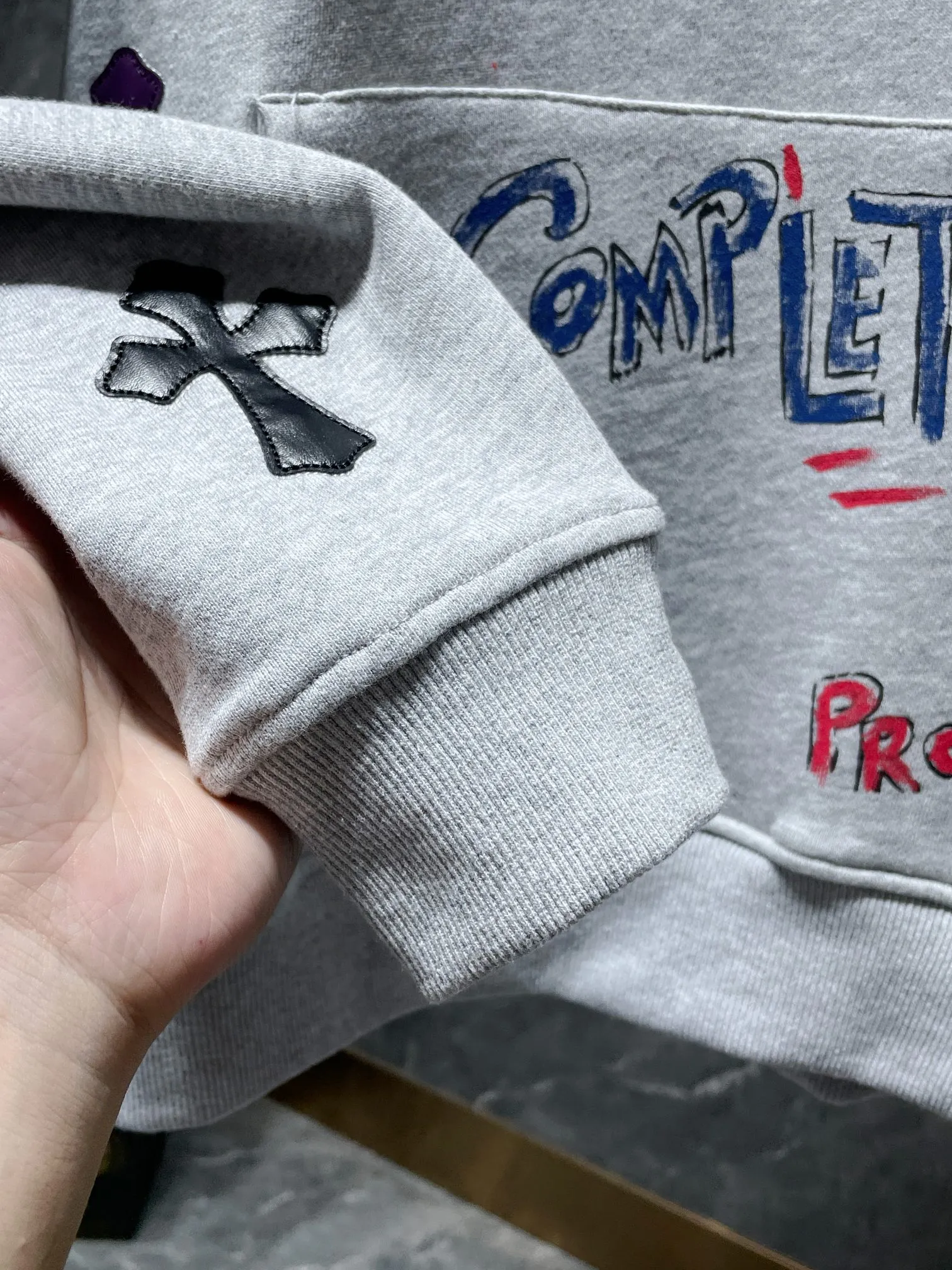 P276 Chrome Hearts Autumn and Winter 2025 Counter Synchronization Colorful cross leather Sanskrit hand-painted graffiti hooded sweatshirt Ins celebrity couple must-have, same style for men and women! The highest version! ! Imported leather! ! A must-have for internet celebrities! Recommended colors: white, black, gray Code numbers: S, M, L, XL